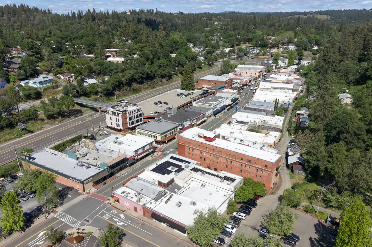 Homes and pine forest on the hillsides above Placerville in El Dorado County